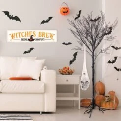 National Tree Company 27" Animated Halloween Hanging Skull, Sound Activated