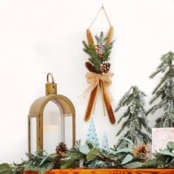 17" Holiday Skis Artificial Floral Christmas Wall Decor - National Tree Company